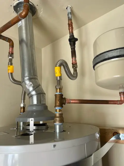 Water heater installation and plumbing repair in Creekwood Hills
